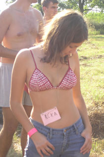 Blue bikini tanned and