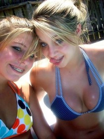 Brunette hottie kissing a